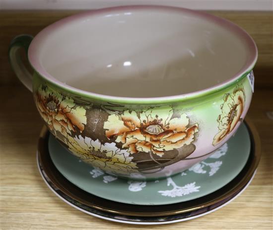 A chamber pot and three plates